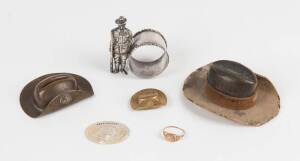 A collection of Anzac memorabilia, including hat locket, hat statue, rare inkwell, digger napkin ring, AIF gold signet ring, carved mother of pearl emblem "Dear Mother", Anzac Shire Plaque(7 items) 