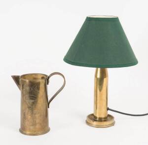 Trench art jug engraved with portrait of Lord Kitchener (19cm), & a WW2 period brass shell case table lamp (37cm). 2 items