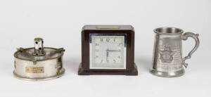 Trench art ashtray, bakelite clock with R.A.A.F presentation plaque & a tankard. (3 items)