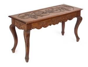 School of Robert Prenzel occasional table carved with griffins, Australian blackwood circa 1915. 48cm high, 92cm wide, 35cm deep