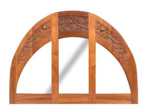 An Australian Arts & Crafts mirror carved with gum nuts & leaves, Blackwood, early 20th Century. 86cm high, 118cm wide.