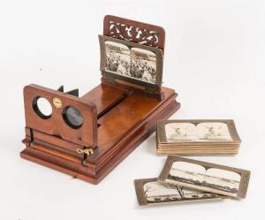 ROWSELL (England): Rowsell's Patent Graphoscope, c1875, mahogany body, with a pair of sliding viewing lenses and plaque inscribed "ROWSELL'S PATENT GRAPHOSCOPE", and an adjustable stereograph rest.  Accompanied by 26 stereocards depicting the visit of "Th