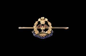 A Duke of Cambridge's Own Middlesex Regiment tie pin, 15ct yellow gold and enamel, weight 3.49 grams; to be sold with a Brunei badge, 9ct yellow gold, weight 6.17 grams.