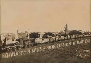 A rare silver gelatin print captioned in photograph "Hugh.McKay Sunshine Harvester For America Complete Train Load. 300 tons. July 1903". 37 x 26cm