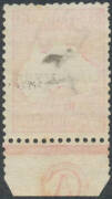 10/- grey & pink 'CA' Monogram single with 'Specimen' Handstamp BW #47xz, the monogram slightly trimmed at the base (as usual) & the corners in the margin clipped, a couple of short perfs & with very little gum. [The ACSC records a 'Specimen' block of 6 w - 2