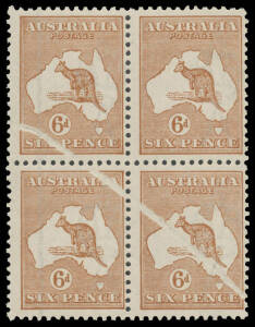 6d chestnut block of 4 affected by the removal of a piece of foreign matter resulting in a Dramatic Void across Three Units, lightly mounted.