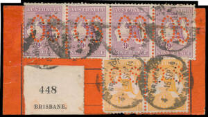 1914 usage of large-part black/red parcels label with rare franking of First Wmk Large 'OS' 9d strip of 4 & Small 'OS' 4d orange pair tied by 'PARCEL POST/BRANCH/16SEP14/BRISBANE' cds, small black/white 'BRISBANE' parcel post label, a couple of minor perf