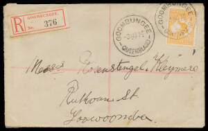 1914 commercial cover to Townsville with a very well centred Kangaroo 4d orange tied by very fine 'GOOMBUNGEE/QUEENSLAND' cds, scarce red & black/white registration label, toning mostly on the reverse.