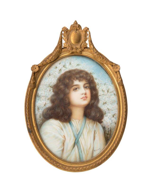 A miniature framed portrait of a girl painted on ivory in ormolu frame, late 19th Century. 9 x 12cm