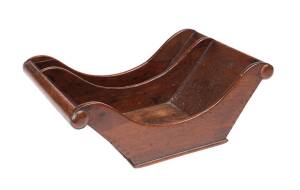 A Regency mahogany cheese wheel holder. 14cm high, 40cm wide, 29cm deep