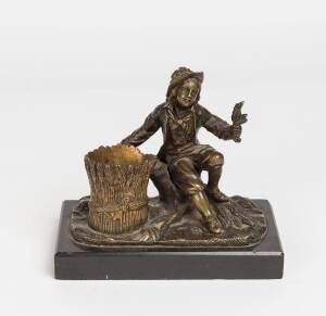 A small black marble and bronze figured desk stand, 19th Century15cm high, 17cm wide,  9cm deep