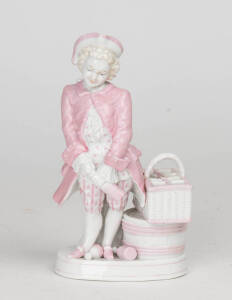 A German porcelain figurine, late 19th Century. 