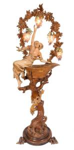 A Black Forest standing lamp, carved wood with glass grape bunch shades, German & possibly Bohemian glass, circa 1900. 220cm high