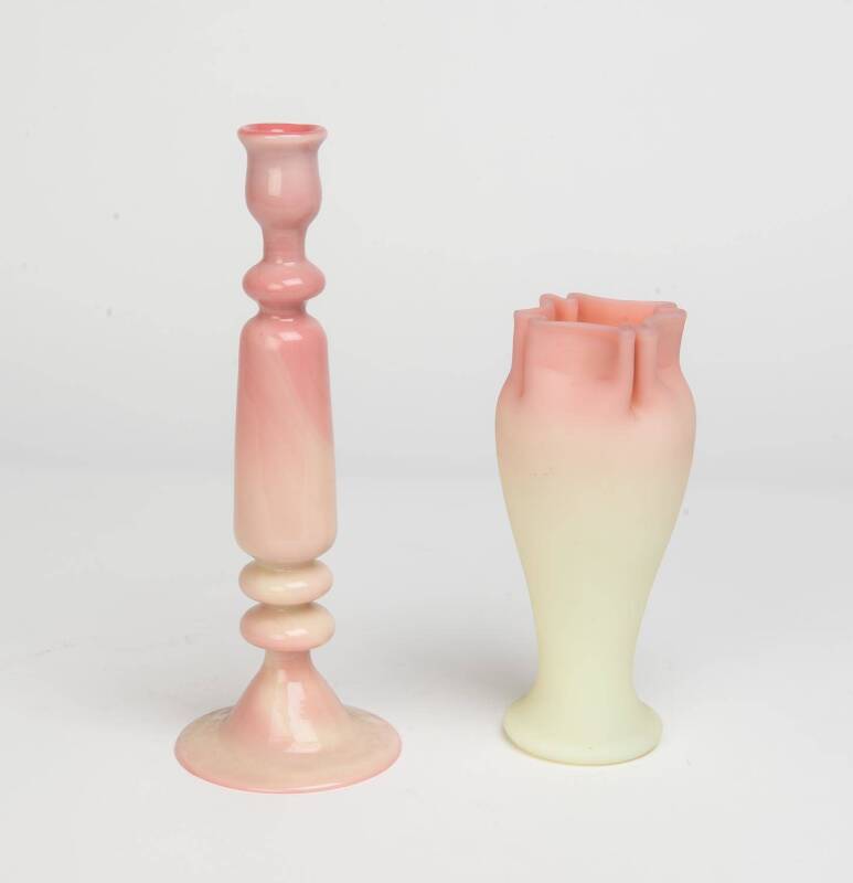 A baluster shaped Burmese glass vase & a candlestick, 19th Century24cm high