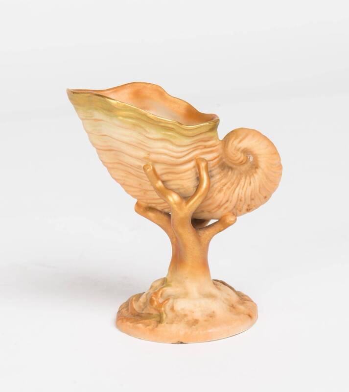 A small Royal Worcester cornucopia vase, dated 1904. 9.5cm high