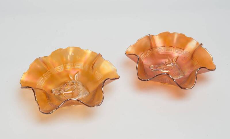 A pair of serpentine edged glass dishes by Dugan 'Pony' pattern, American, 20th Century22cm diameter