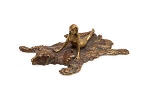 A Bergman bronze nude on bear skin rug, stamped "B" on base, Austrian, circa 1900. 11.5cm