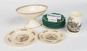 A collection of 18th century Wedgwood cream ware comprising an oval comport, two plates, a mug, 8 Wedgwood green vine plates & 3 advertising signs