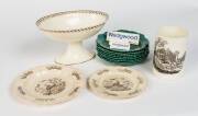 A collection of 18th century Wedgwood cream ware comprising an oval comport, two plates, a mug, 8 Wedgwood green vine plates & 3 advertising signs