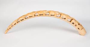 A carved ivory elephant bridge, East African, early 20th Century. 105cm