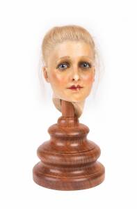 A Victorian wax head model of a girl with real human hair & glass eyes (later base). 17cm high