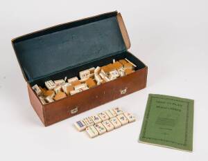 A Mah-Jong set in leather case with booklet, bamboo & bone, circa 1920s