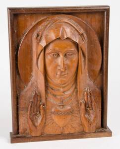 A religious carved wooden panel, Australian, mid 20th Century, monogram lower left. 28 x 36cm