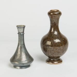 An Indian silver inlaid metal vase & a speckle glazed ceramic vase. Taller: 20cm high