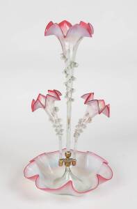 A Victorian ruby vaseline glass epergne, 19th Century. 51cm high