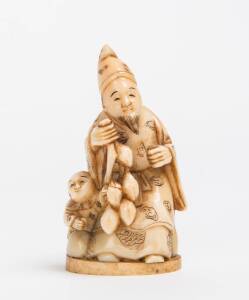 A Japanese ivory sculpture of a man & child, 20th Century, 7.5cm