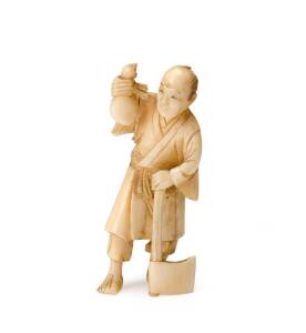 A Japanese ivory figure of a man standing with an axe and double gourd