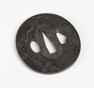 A Japanese bronze sword guard, 17th-18th Century, 7cm diameter