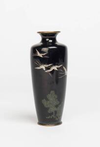 A Japanese cloisonné vase with a dark background decorated with birds & trees. 15cm high.