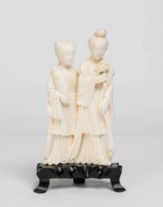 A Chinese ivory figure group on timber stand, early 20th Century. Ivory 15cm 