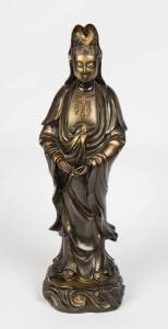 A large lacquered figure of Guanyin, 20th Century. 74cm high