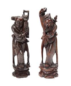 A pair of Chinese wooden Taoist figures with silver inlay, 20th Century, 29.3cm height (each)