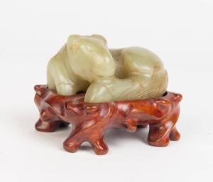 Four Chinese stone carvings including one white jade square plaque, & one celadon jade horse, 20th Century. Approximately 6cm long (each) 