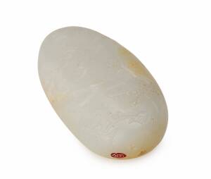 A white Jade border, 20th Century, 8.5cm long, 5.5cm wide