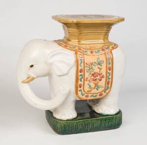 A pair of Chinese glazed ceramic garden seats in the form of elephants. 56cm high 