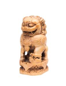 A carved Chinese ivory Foo dog chop seal, Qing dynasty.