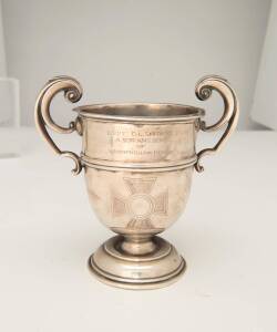 Victorian Cross interest, an Edwardian silver two-handled cup, Charles Pilling, London 1905, engraved with a Victorian cross and inscribed 'Lieut. C.L. Smith V.C, a Son and Hero of Whippingham Parish'12.8cm high, 136 grams, together with a photocopy photo