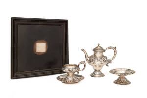 A Continental silver coffee pot, sugar bowl, cup, saucer & ebonised timber tray with silver plaque inscribed with Austrian dedication, circa 1901. (5 items). pot 13.5cm