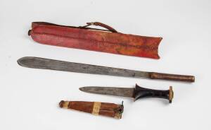 Two tribal hunting knives, one most likely African, possibly Zulu. Longest 53cm