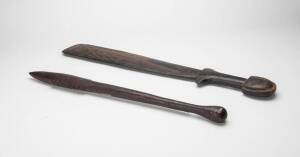 Two clubs, Trobriand Islands (circa 1900), carved hardwood. 56.5cm & 67cm long 