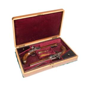 A pair of flintlock duelling pistols by Simmons of London; with powder flask & tools housed in fitted walnut case, early 19th Century. 