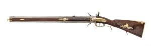 A rare German under & over flintlock cap gun with unusual swivel barrel, stamped "Gross Mezeritsch", Circa 1840. 107cm long