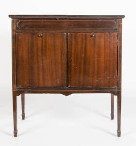 A hardwood hinged-top music cabinet, circa 1920. 81cm high, 77cm wide, 48cm deep together with an Edwardian style mahogany dining chair and a foot stool, English, 20th century