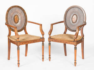 A pair of Edwardian mahogany cane seated carver chairs, English, early 20th Century