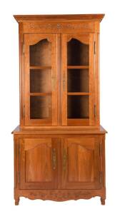 A pair of French provincial style fruitwood bookcases, 20th century262m high, 138cm wide, 60cm deep 