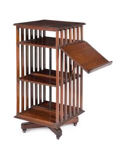 A revolving bookstand, Australian blackwood with dropside bookrest, early 20th century. 106cm high, 51cm wide, 53cm deep